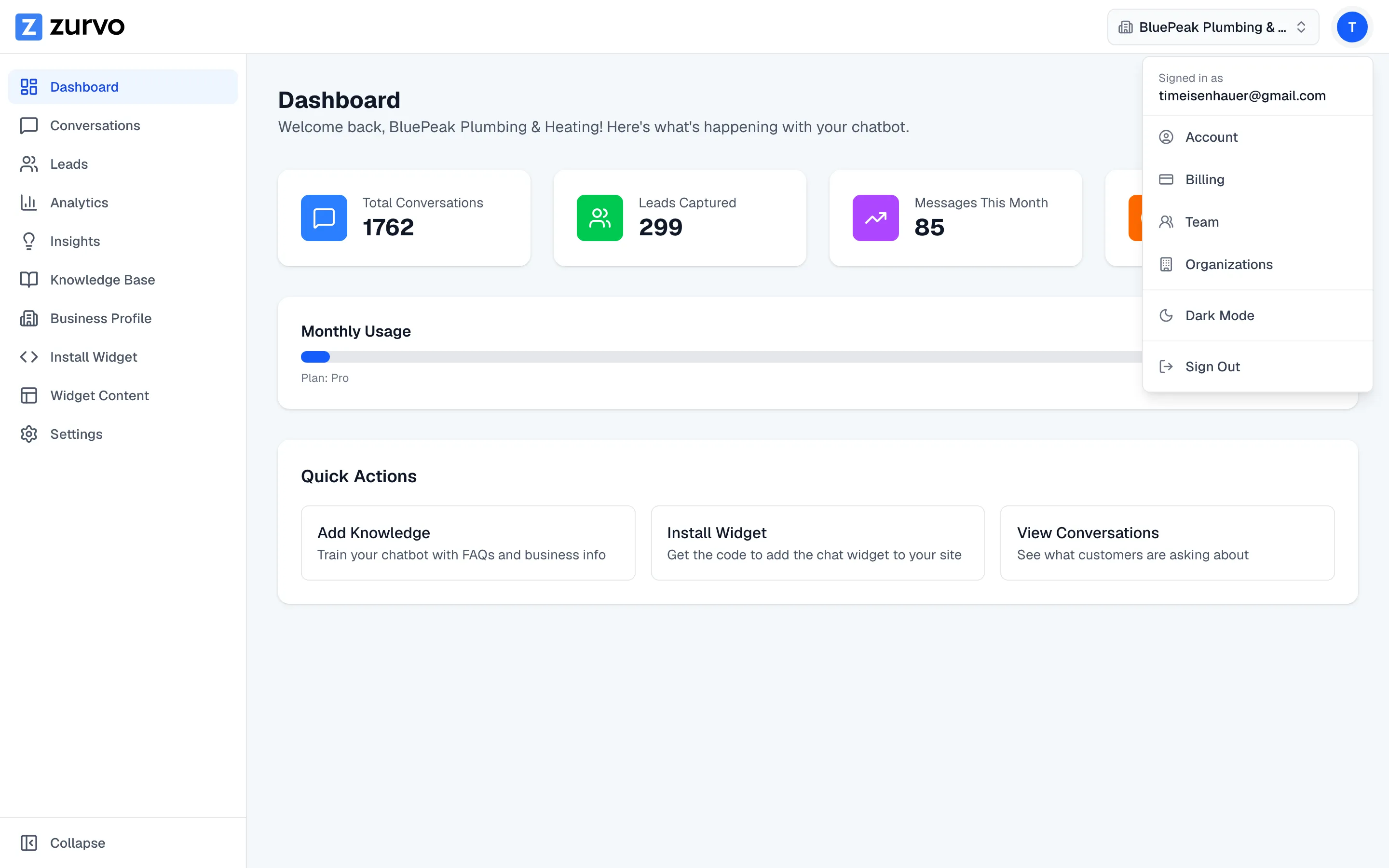 The dashboard top bar with the organization switcher and account menu open.